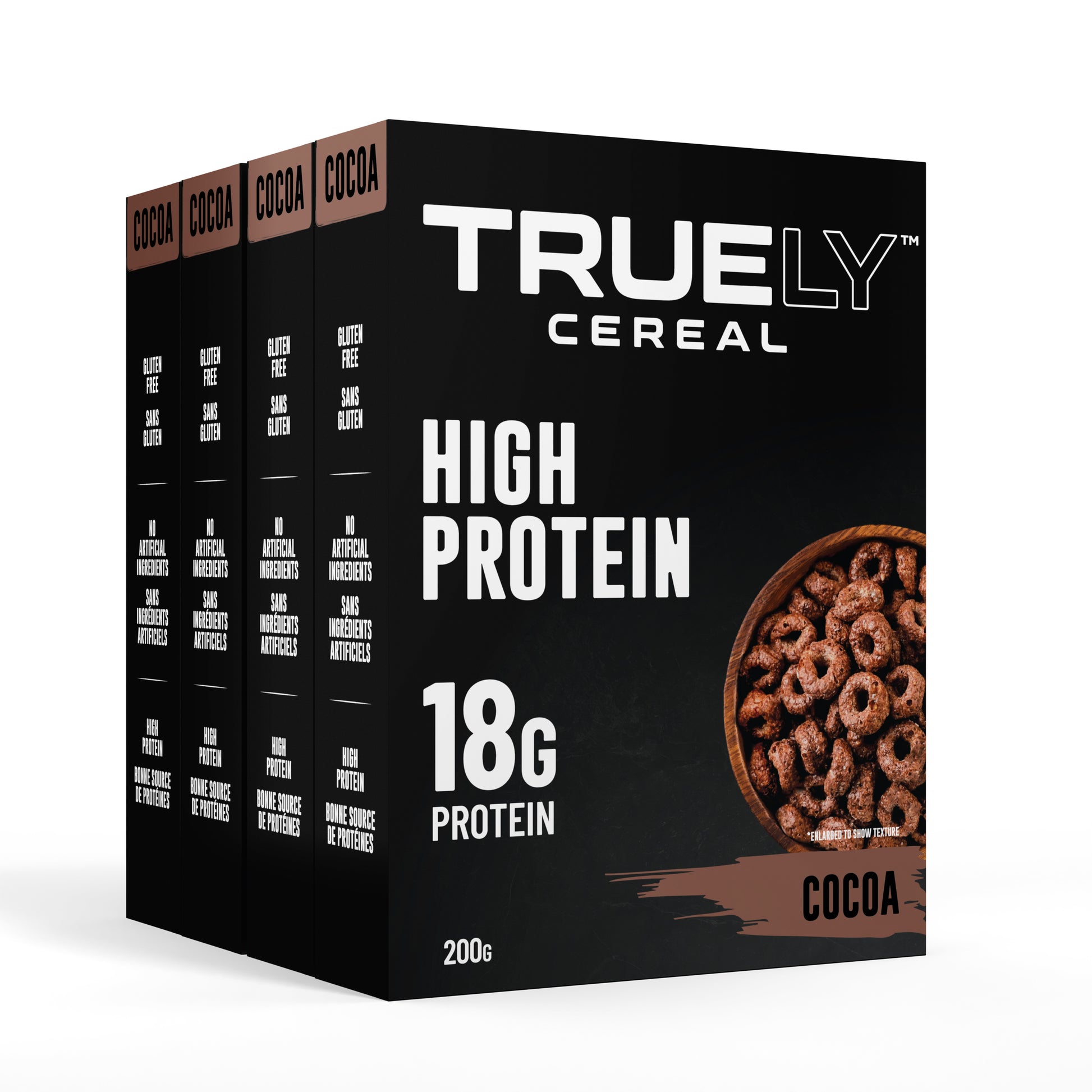 Four boxes of Truely High Protein Cocoa cereal arranged side by side with the front box prominently displayed. The packaging is black with white and brown text and graphics indicating the product is a high protein cereal with 18g of protein per serving.