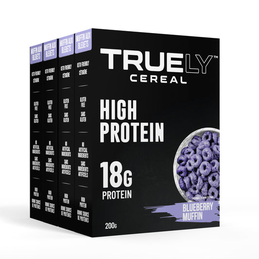 Boxes of Truely High Protein Blueberry Muffin flavored cereal, with a picture of the cereal on the front, indicating 18g of protein per serving.