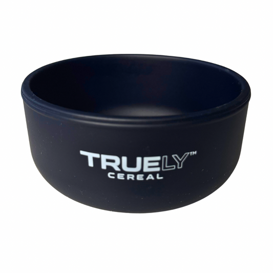 A black silicone bowl with the 'TRULY CEREAL' brand name printed on the side.